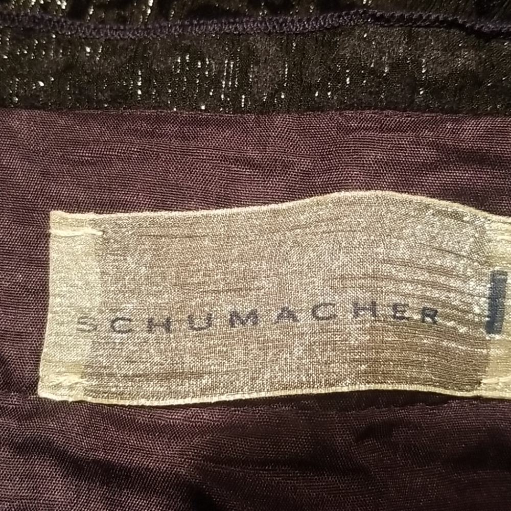 Black pattern skirt wife wears 4 and 6. No tag